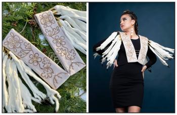 A shawl that looks like two narrow white panels that are connected by strings of crystals are decorated with long ermine pelts at the shoulders. At right a woman models the shawl twirling her upper body to make the ermine pelts swing.