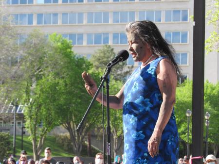 Kohkum Kathy Hamelin, who led the opening smudge and prayer, bathed herself in mud